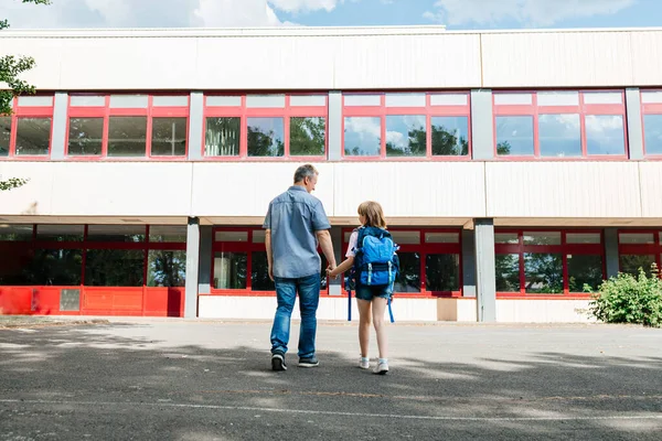 View Back Dad Child Holding Hands Going School Parents Accompany — Fotografia de Stock