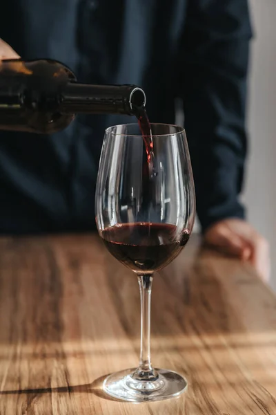 Close Man Sommelier Pouring Red Wine Bottle Glass — Fotografia de Stock