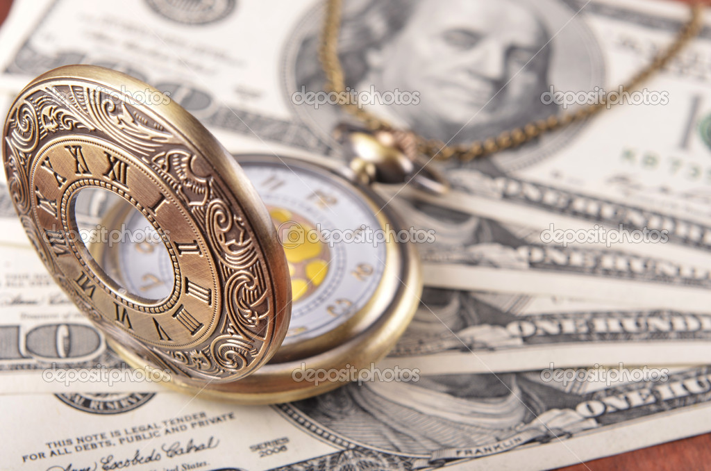 Pocket watch on money