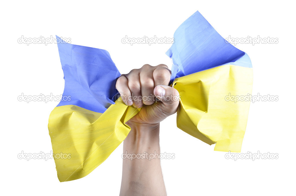 Hand grasps the Ukrainian flag