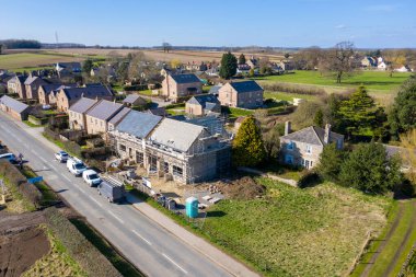 İngiltere 'nin Yorkshire' daki Wetherby köyünün havadan çekilmiş fotoğrafı köyde inşaat çalışmalarının yapıldığını gösteriyor.