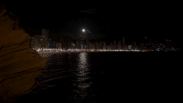 Night Footage Full Moon Spanish Town Benidorm Showing Ocean Waves — Stockvideo