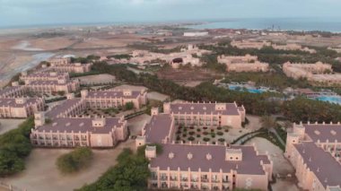 Aerial footage showing the wonderful Hotel Riu Palace Cabo Verde & Hotel Riu Funana, showing the Hotels rooms and Swimming Pools