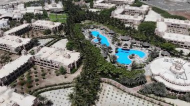 Aerial footage showing the wonderful Hotel Riu Palace Cabo Verde & Hotel Riu Funana, showing the Hotels rooms and Swimming Pools