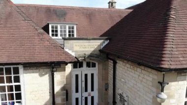 Pickering UK 1st Oct 2018: Aerial footage of The Pickering Community Junior School in the village of Pickering in North Yorkshire in the UK showing a top down view of the historic building and grounds