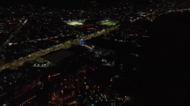 Night time aerial footage of the beautiful town of Puerto Vallarta in Mexico, the town is on the Pacific coast in the state known as Jalisco, Mexican town.
