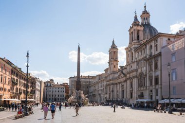 Piazza Navona and Fontana dei Quattro Fiumi (Fountain of the Four Rivers) by Bernini, Baroque church Sant'Agnese in Agone, Egyptian obelisk.