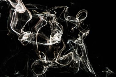 Smoke effect texture. Isolated background. Black and dark backdrop. Smokey fire and mistic effect. Spirit wave. Photo realistic mist stock image.