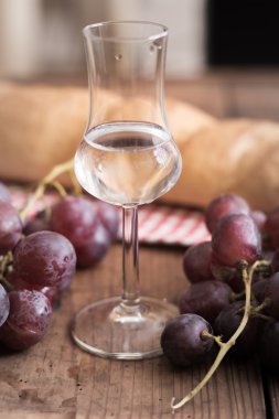 Grappa with Grape and Bread clipart