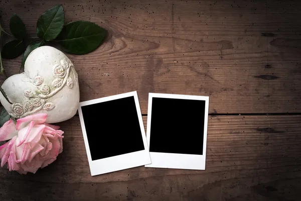 Vintage Polaroid frame on wood — Stock Photo, Image