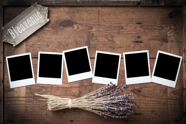 Vintage polaroid fotoframe op hout met lavendel en teken — Stockfoto