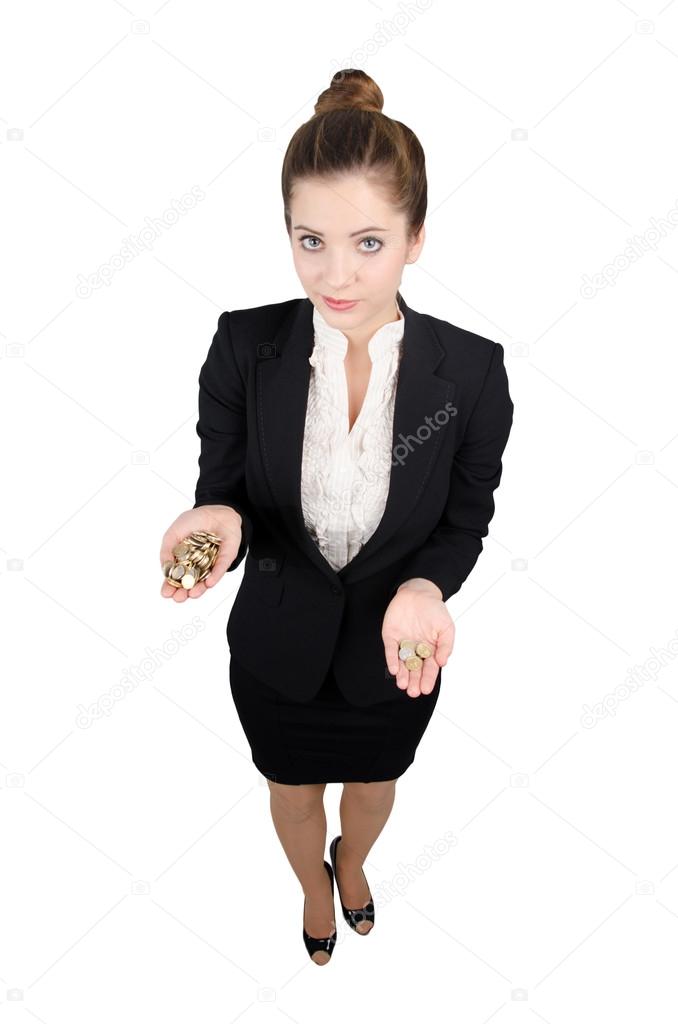 Smart business woman, an employee of a large company, one hand holding a handful of coins, the other holding a few coins showing the amount of the profit and loss decisions.