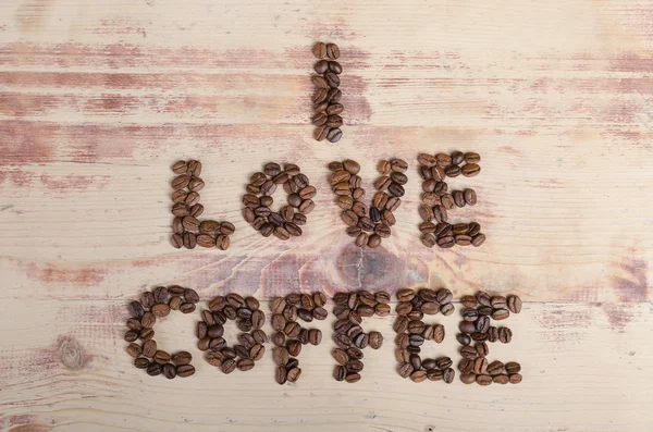 Beschriftung Ich liebe Kaffee aus Bohnen auf Holz — Stockfoto