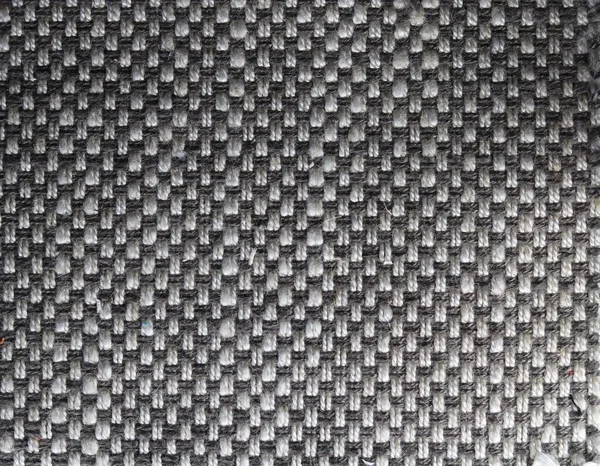 Textured fabric in contrasting shades of grey and white with copyspace — Stock Photo, Image