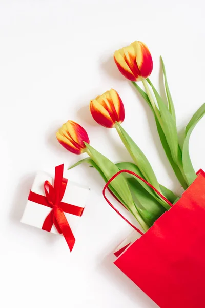 Flat Lay Composition Red Yellow Tulips Red Paper Bag Gift — Stock Photo, Image