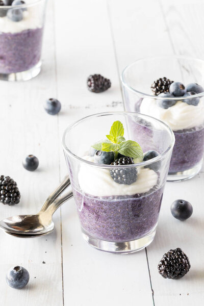 Delicious blueberry chia pudding parfaits topped with vanilla yogurt and berries. 