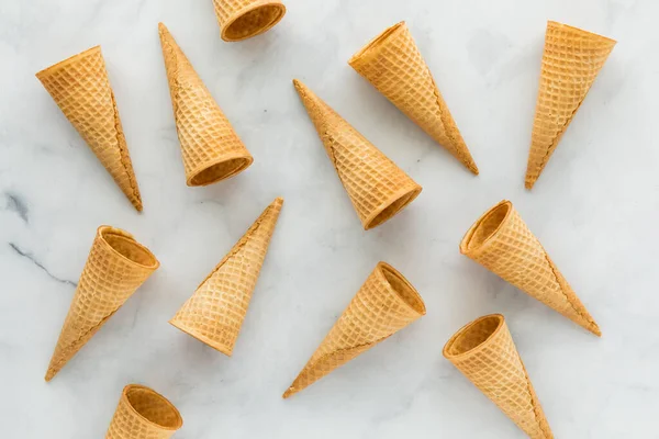 Empty Waffle Cones Scattered Marble Background — 스톡 사진