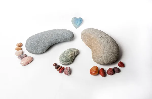 家庭的脚印所作的光滑的石头 — 图库照片