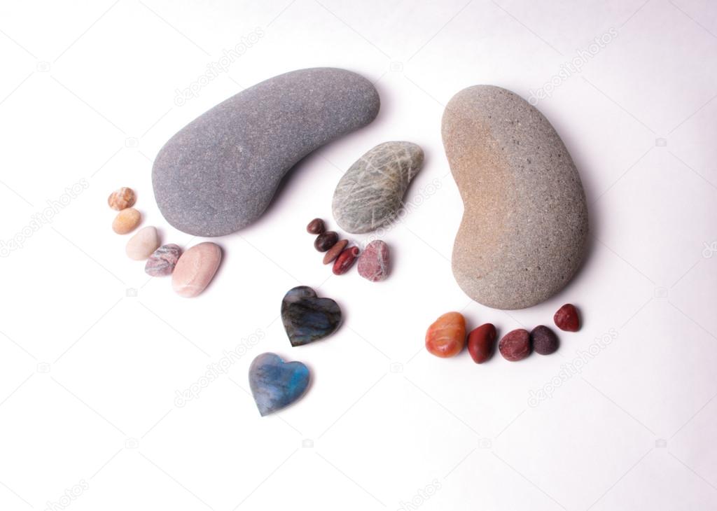 Family of feet made of smooth pebbles