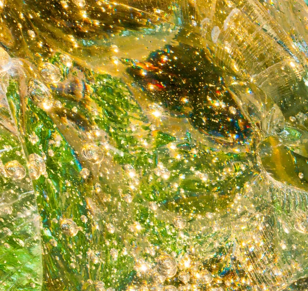 Bublinky uvězněné ve velké skleněné bloku — Stock fotografie