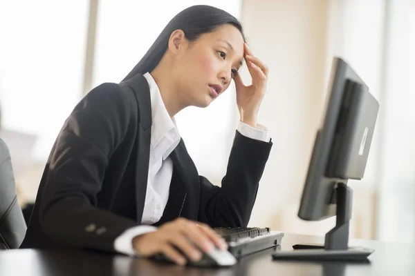 Overworked Businesswoman Working On Computer — Stock Photo, Image