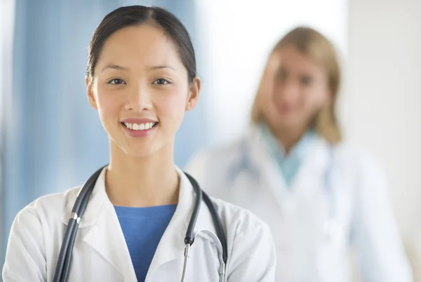 Confident Asian Doctor Smiling In Clinic — Stock Photo, Image
