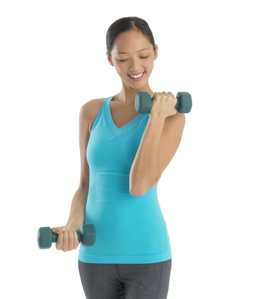 Happy Woman In Fitness Clothing Lifting Dumbbells — Stock Photo, Image