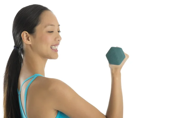 Side View Of Happy Woman Lifting Dumbbells — Stock Photo, Image