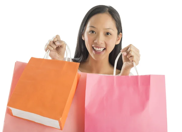 Mujer Shopaholic llevando bolsas de compras — Foto de Stock