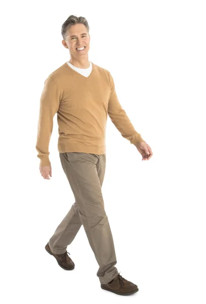 Happy Mature Man Walking Over White Background — Stock Photo, Image