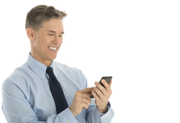 Businessman Text Messaging Through Mobile Phone — Stock Photo, Image