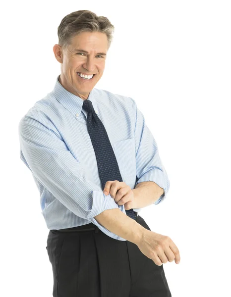 Happy Businessman Rolling Up His Sleeves — Stockfoto