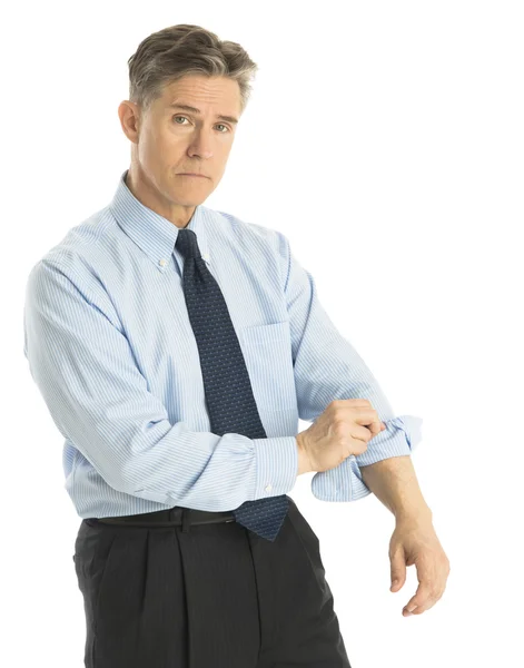 Portrait Of Tired Businessman Rolling Up His Sleeves — Stockfoto