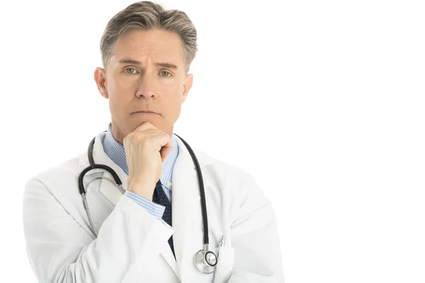 Portrait Of Thoughtful Male Doctor With Hand On Chin — Stok Foto