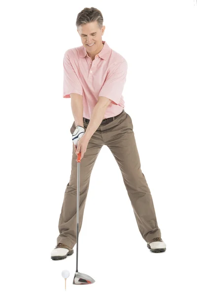 Pełna długość dojrzały mężczyzna gry w golfa — Zdjęcie stockowe