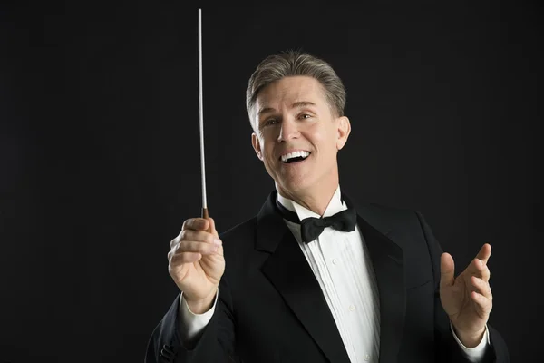 Male Orchestra Conductor Looking Away While Directing — Stock Photo, Image