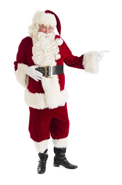 Porträtt av jultomten pekar — Stockfoto