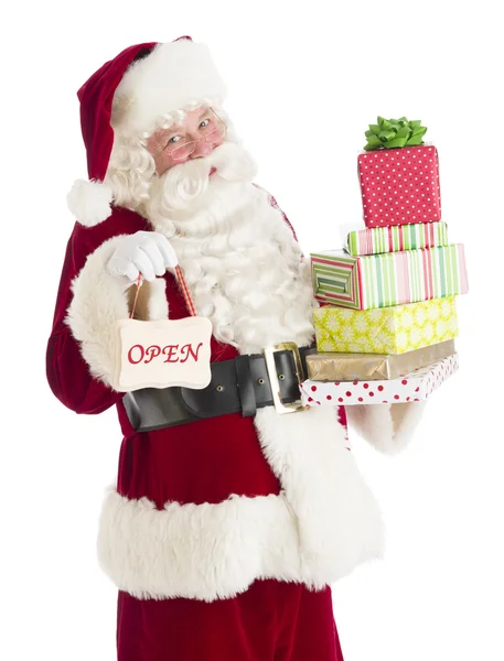 Portrait du Père Noël avec des cadeaux et signe ouvert — Photo