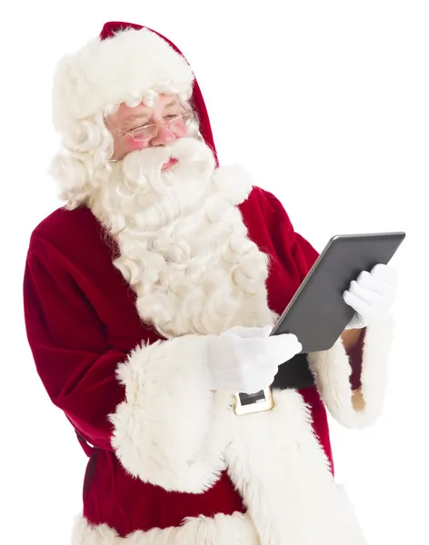 Santa Claus Looking At Digital Tablet — Stock Photo, Image