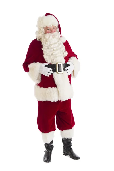 Porträtt av jultomten med händerna på magen — Stockfoto