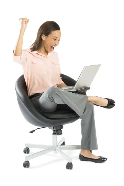 Successful Businesswoman With Laptop Clenching Fist — Stock Photo, Image