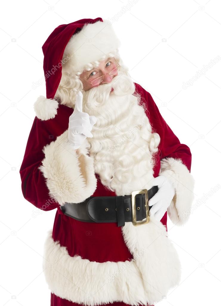 Santa Claus Pointing Against White Background