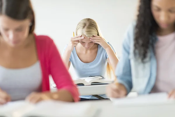 Frustrated Teenage Student Sitting At Desk — Stock Photo, Image