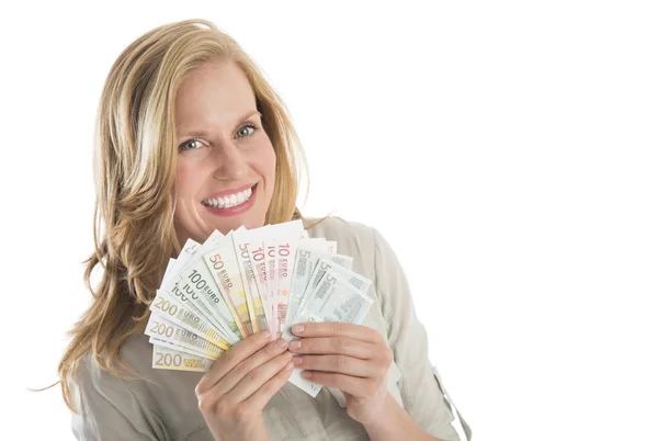 Woman Holding Fanned Euro Banknotes Against White Background — Stock Photo, Image