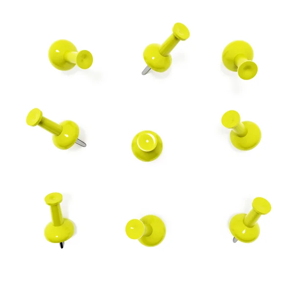 Thumbtacks de ângulos diferentes amarelo — Fotografia de Stock