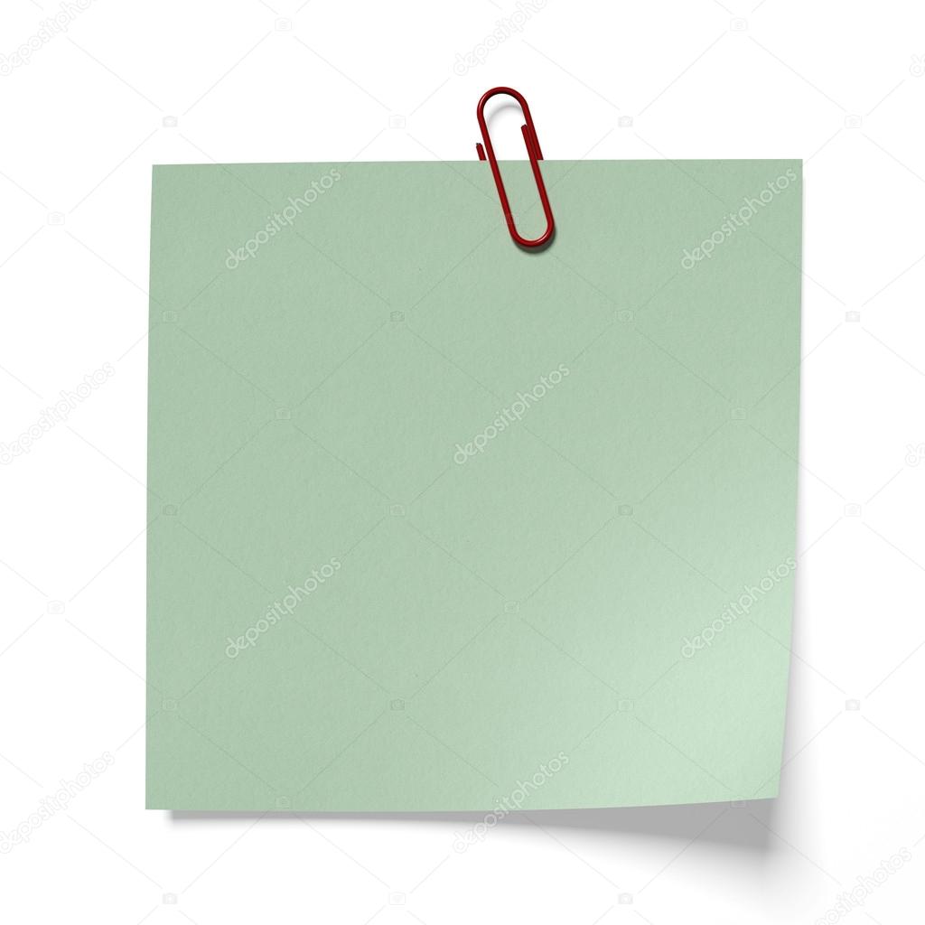 Red paper clip on a green paper