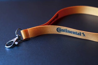 neck lanyards string of continental company on black background.