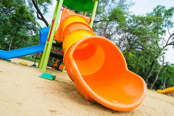 Colorful slider tunnel in a playground — Stock Photo, Image