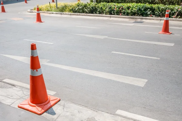 Traffic control cones at side street to prevent car parking — Stock Photo, Image