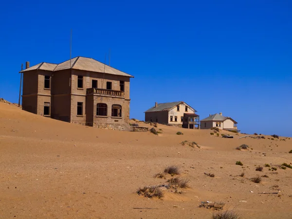 Sabbia in casa abbandonata nella città fantasma di Kolmanskop — Foto Stock
